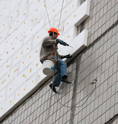 Утепление фасада многоквартирного дома в Волжском
